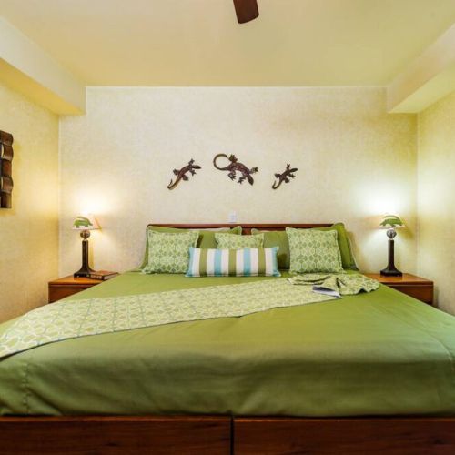 The master bedroom is the perfect place to rest after a long day on the beach.