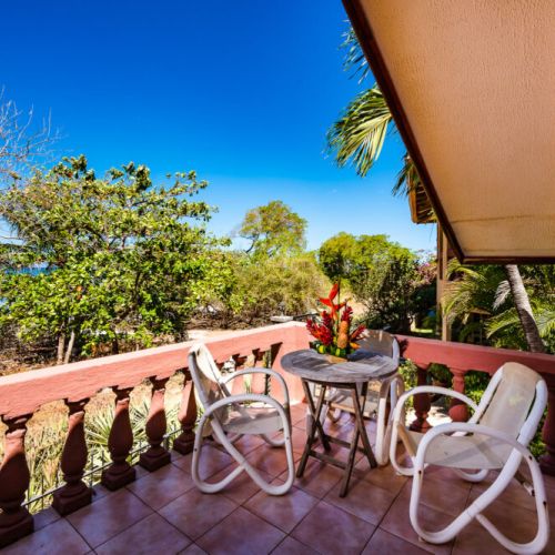 Sit back, relax and enjoy the view of beautiful Langosta Beach from the upstairs balcony.