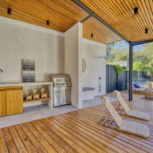 The house has a grill to enjoy BBQ meals around the pool.