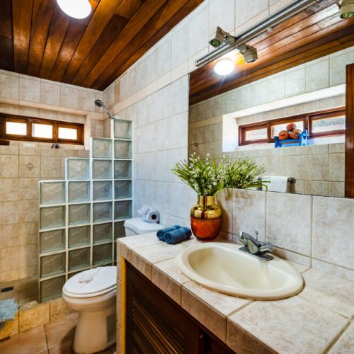 This full bathroom is located on the main floor near the master bedroom.