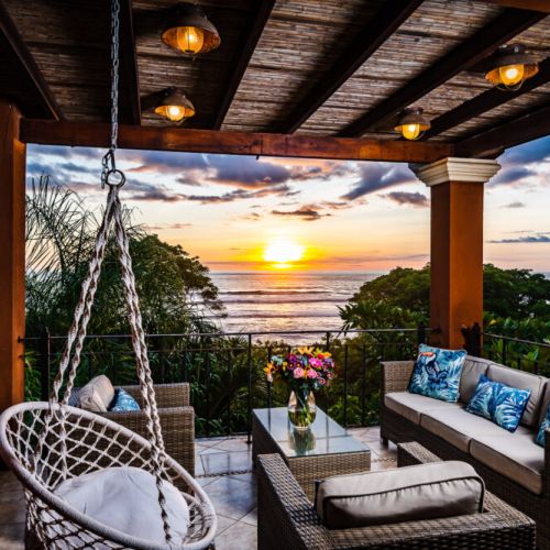 Beautiful outside patio with a sitting hammock where you will not want to miss a single sunset of the Pacific Ocean.