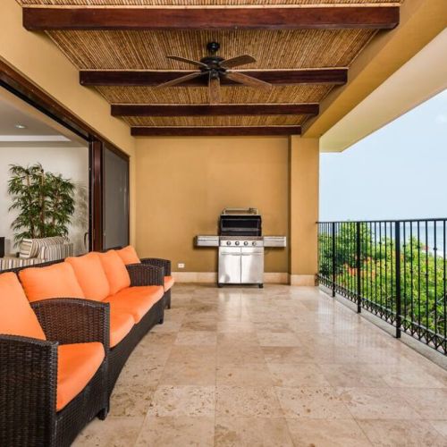 Grill on your balcony overlooking the ocean.