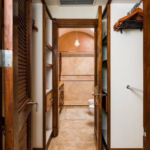 The master bedroom has a large walk-in closet that leads to the master bathroom.
